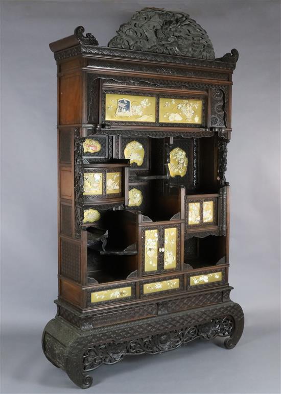 A Japanese Meiji period carved wood and shibayama cabinet, W.4ft 10in. D.1ft 4in. H.7ft 11in.